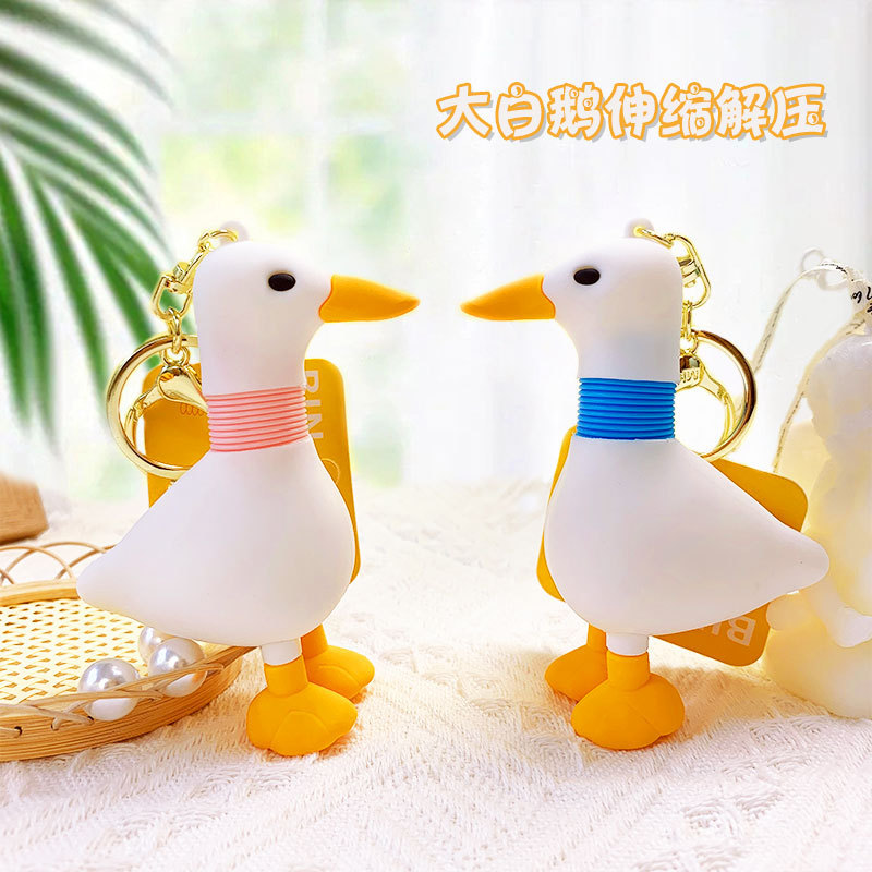 Genuine Cartoon creative telescopic big white goose keychain couple schoolbag pendant car key chain small gift wholesale Genuine Cartoon creative telescopic big white goose keychain couple schoolbag pendant car key chain small gift wholesale