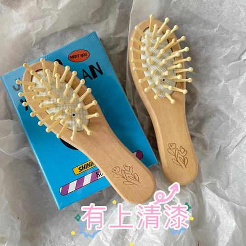 Amazon exports European and American bagged tulip lotus wood leather massage comb portable comb air cushion comb