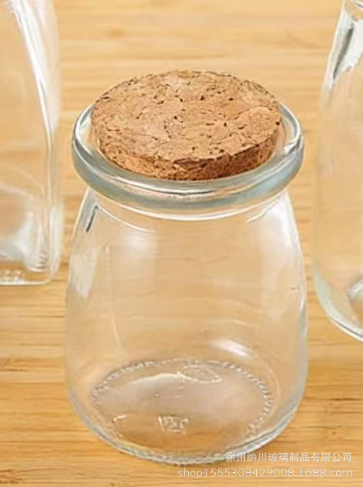 Botella de pudín de vidrio al por mayor de 100ml botella de leche gruesa botella de yogur resistente a altas temperaturas botella de vidrio tapón de madera botella de deseo botella
