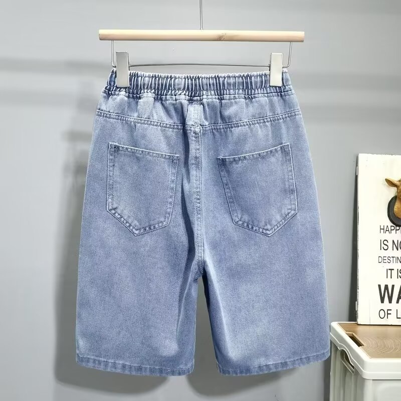 Moda para hombres verano nuevo estilo casual jeans de cinco puntos moda para hombres pantalones cortos sueltos para adolescentes