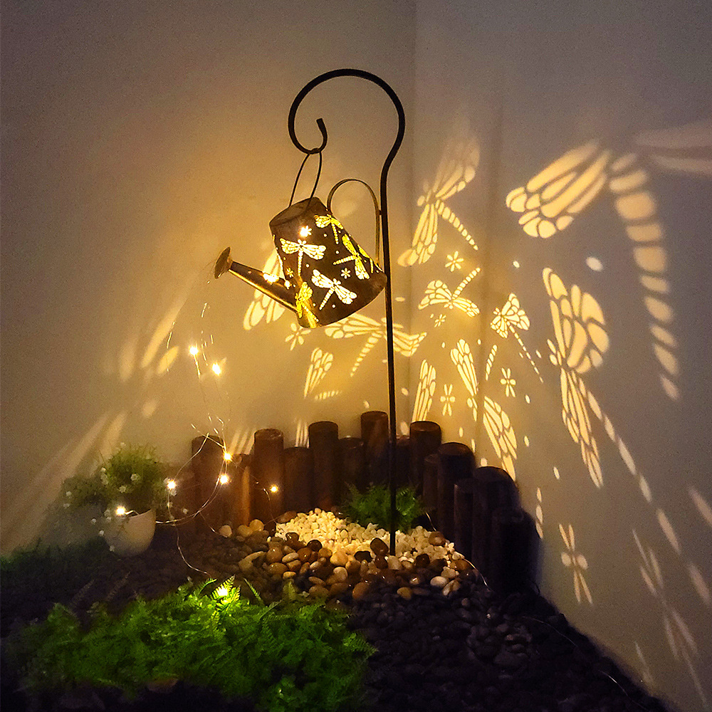 Transfronterizo nueva caldera de hierro lámpara de césped lámpara de jardín lámpara de paisaje agua Libélula lámpara de proyección de dibujos animados