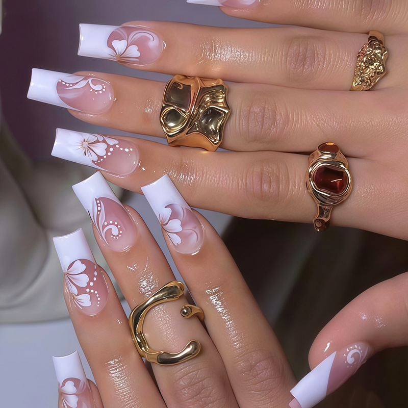 Simple and romantic white French-style gradient floral and leaf pattern design with 3D gold bead decoration for wearable nails
