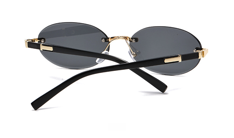 1584 New European and American Trendy Cut Edge Distinctive Oval Frame Sunglasses 2024 New Arrival Frameless Hot Girls Hip Hop Sunglasses_voghion.com