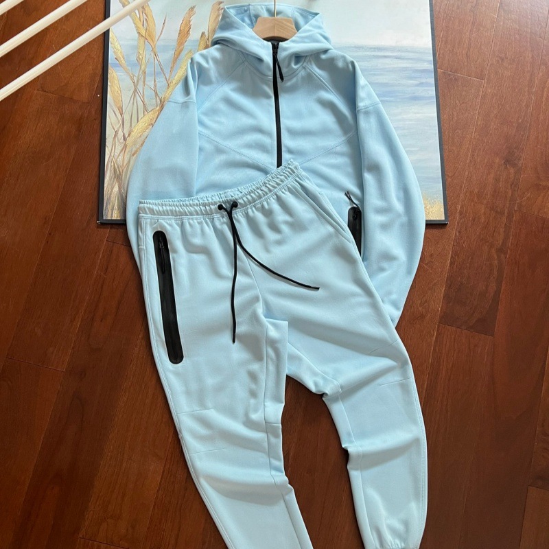 Sports suit capa de aire algodón traje deportivo hombre manga larga con capucha chaqueta de color a juego pantalones con cremallera de goma