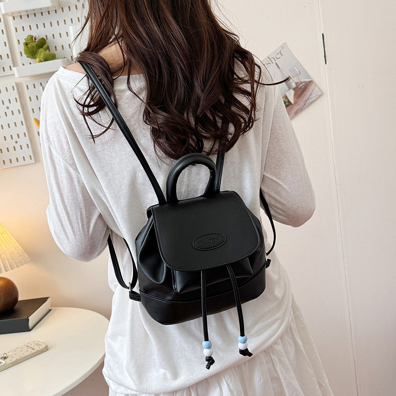 Bolsa de hombro retro estilo académico para mujeres verano 2025 nuevo estilo coreano color de contraste mochila versátil bolso de cubo portátil