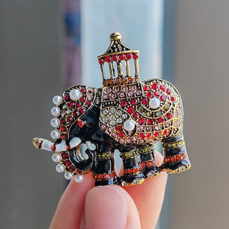 Estilo de moda de esmalte elefante broche animal anti-luz damas broche atmósfera nuevo hombre traje accesorios broche