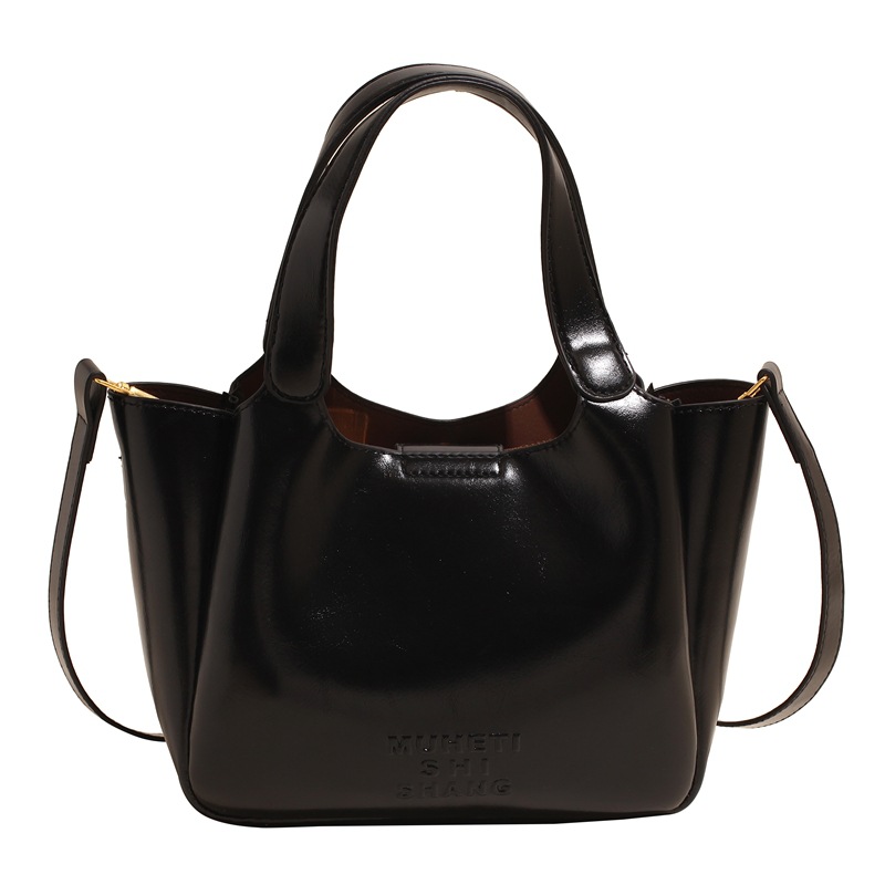Vintage Maillard bolso de mano para mujeres 2025 nuevo estilo transfronterizo popular aceite cera cuero bolso de cubo textura mochila