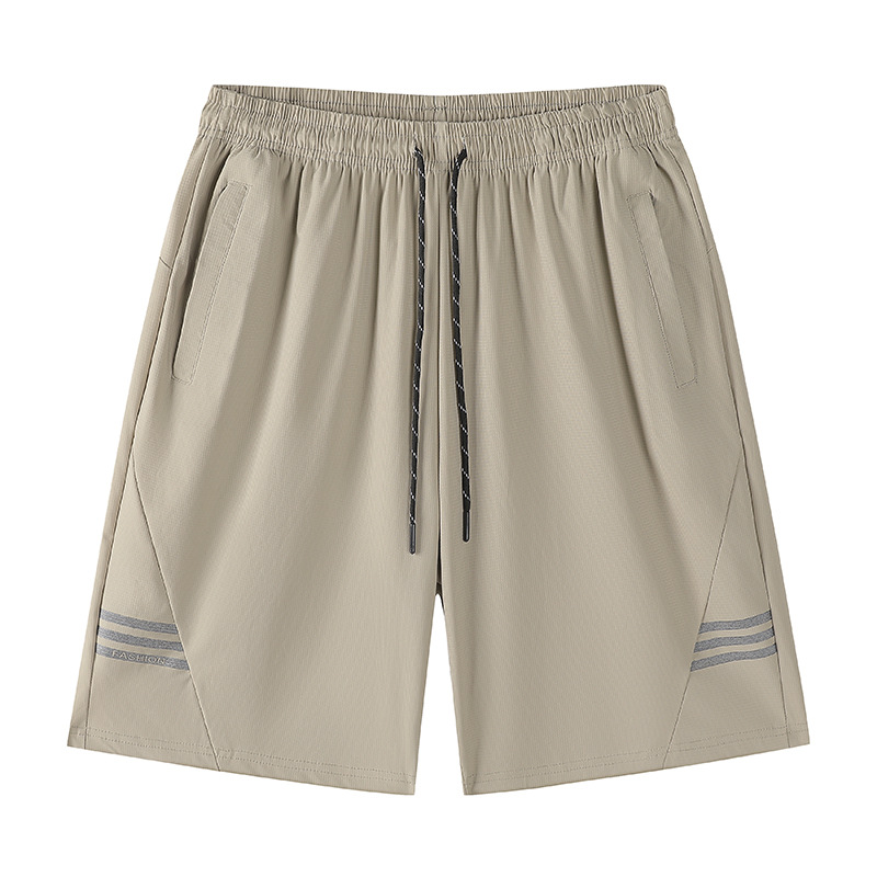 Pantalones cortos casuales para hombres en verano 2024 nueva versión coreana de la tendencia tubo recto relajado y ligero INS cinco división del trabajo pantalones de playa