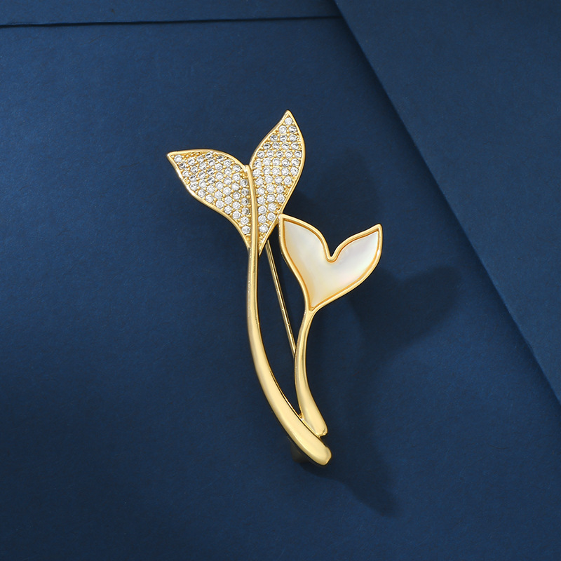Designer style, personalized fishtail brooch, female high-end feeling, niche inlaid zircon corsage, paired with light luxury suit clothing_voghion.com