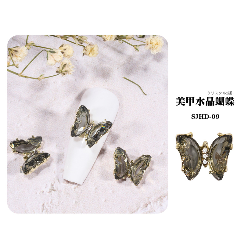 2021 nueva celebridad en línea belleza de uñas mariposa de cristal mágico estilo INS hielo tridimensional transparente Aurora diamante metal decoración de uñas