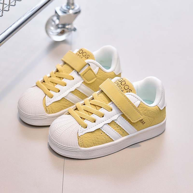 Zapatos de skate para niños zapatos deportivos para niños antideslizantes para niñas casuales versátiles conchas cabeza bebé zapatos blancos zapatos para niños al por mayor