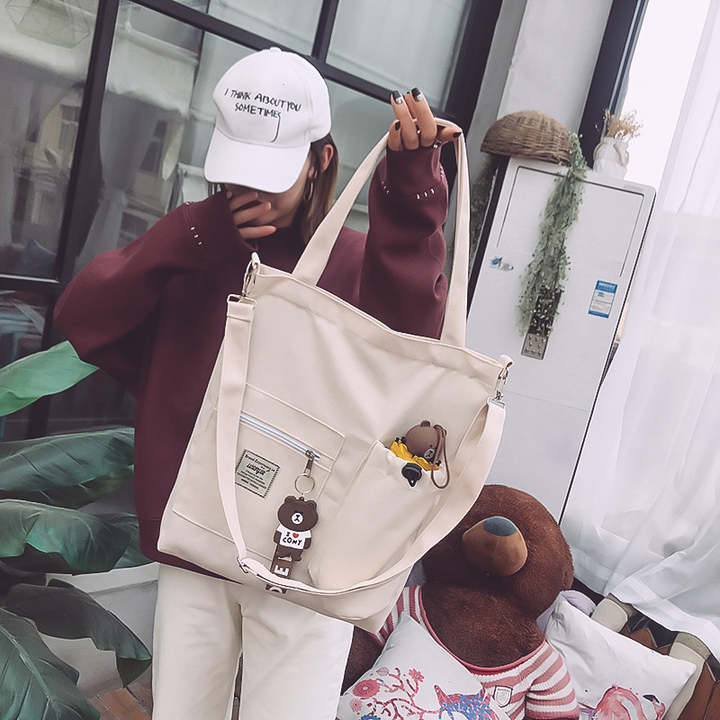 Bolsa de lona de las mujeres bolsa de mensajero estudiante japonés ins estilo bolso de hombro coreano simple todo-fósforo bolso de gran capacidad