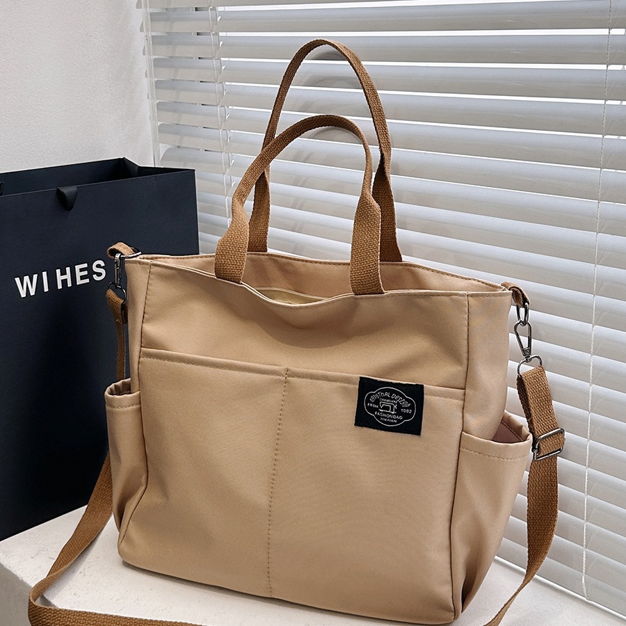 2024新款男女同款单肩包牛津布防水料手提百搭电脑包大容量斜挎包