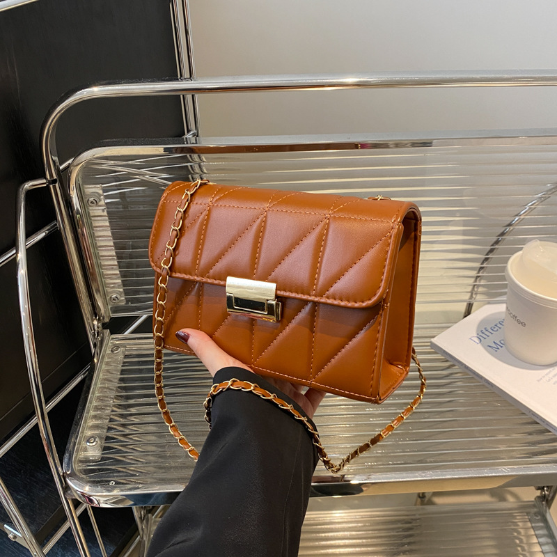 Bolso de cadena de textura de bloqueo de mujer 2024 primavera y verano versátil bolso de hombro de hombro bolso pequeño estilo coreano