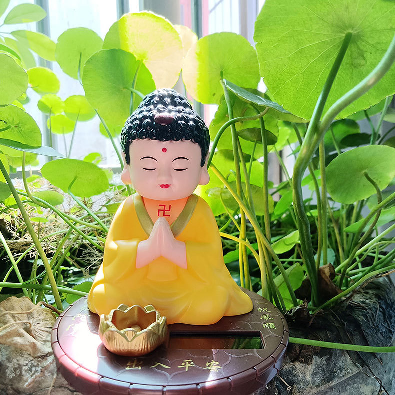 Solar car ornaments Buddha shook his head center console jewelry Net red doll boutique accessories factory direct sales