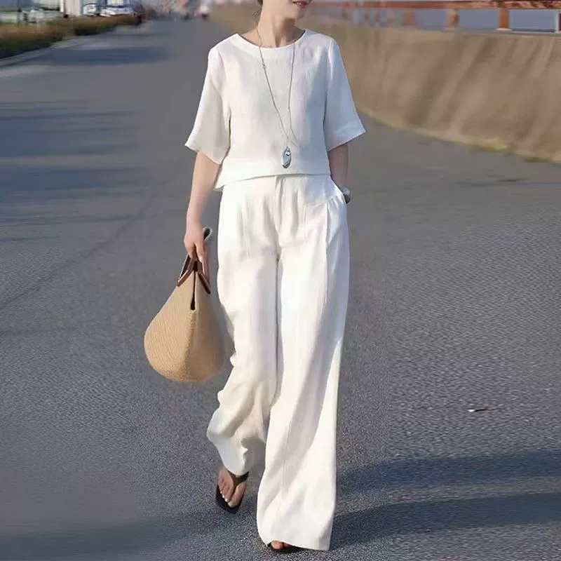 Летний костюм из льна 2025 года, однотонный, женский, свободные прямые брюки, стройнящий силуэт и высокий топ в западном стиле, комплект из двух предметов