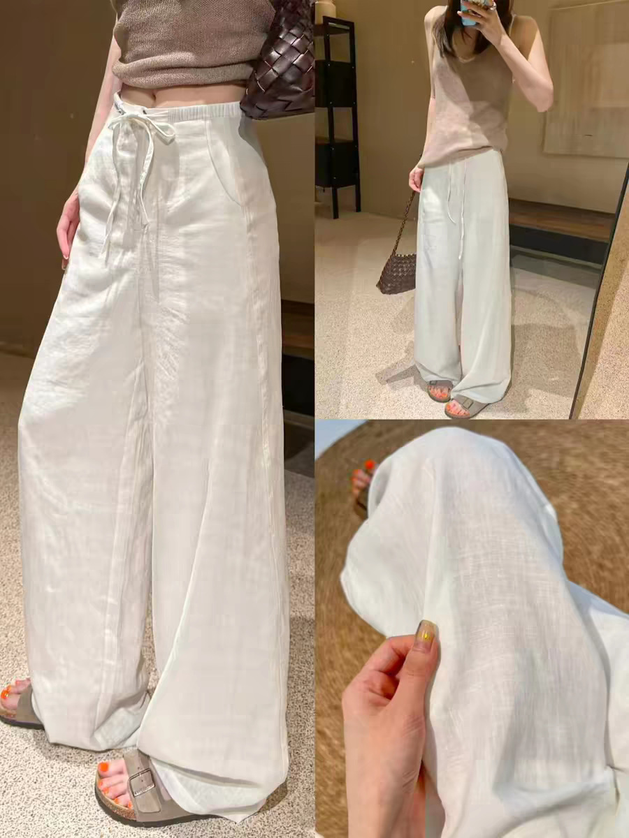 Qadın üçün ağ kətan geniş şalvar, yay üçün uzun model