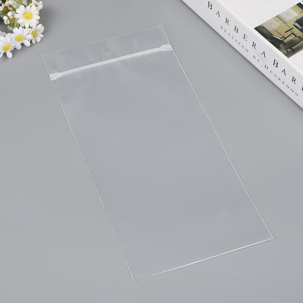 Fabricante spot pe transparente tira de hueso con cremallera calcetines mangas de hielo bufanda de seda bolsa ziplock en blanco con LOGOTIPO