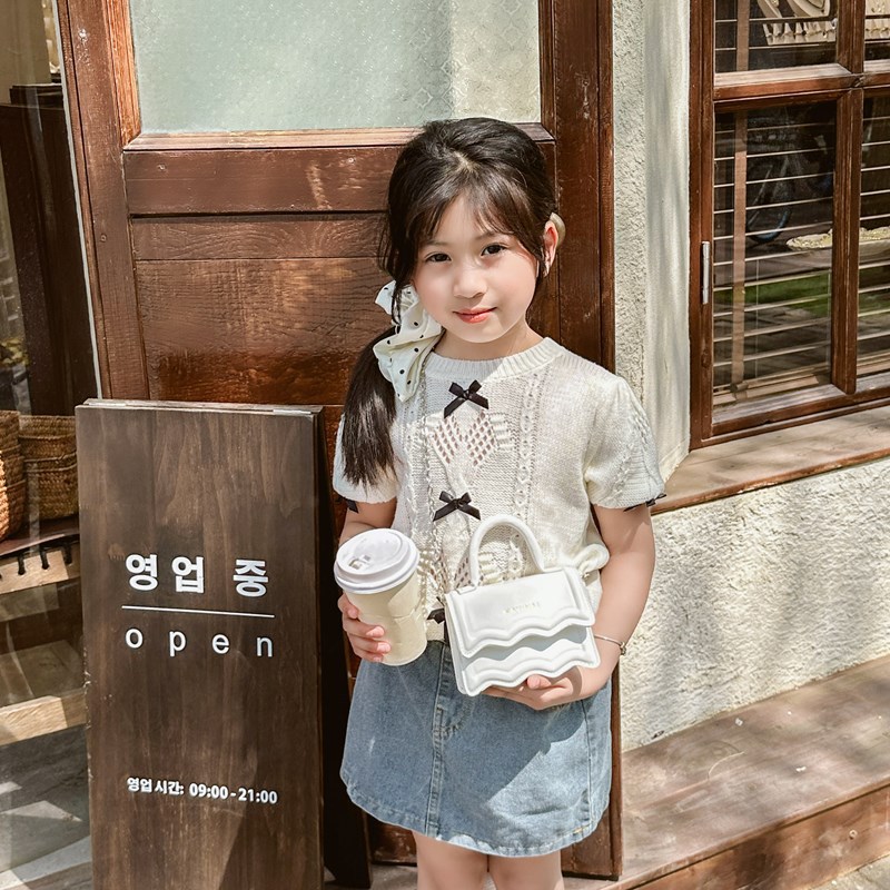 Bolso bandolera de niña coreana moda color sólido estilo occidental mini bandolera para niños verano nuevo alfabeto bolso para niños