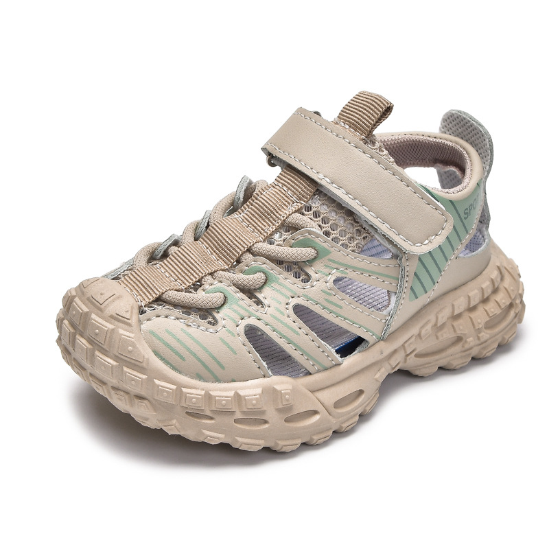 Sandalias deportivas al aire libre para niños 2025 verano nuevo estilo sandalias Baotou antideslizantes y transpirables zapatos de malla única para niñas suela suave