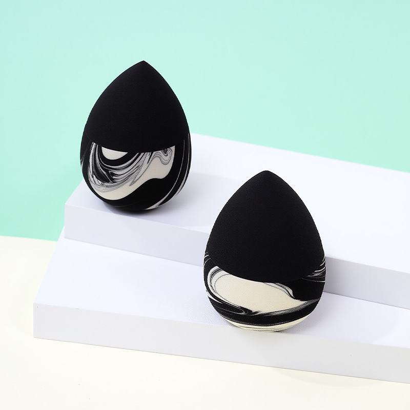 Color mezclado personalizado de fábrica maquillaje transfronterizo huevo de belleza hidrofílico maquillaje sin látex esponja maquillaje huevo de maquillaje en polvo remojo en agua para agrandar