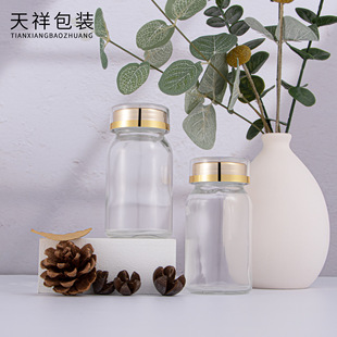 Factory in stock 120ml glass health care bottle solid particles food transparent sub-bottling double plating gold lid