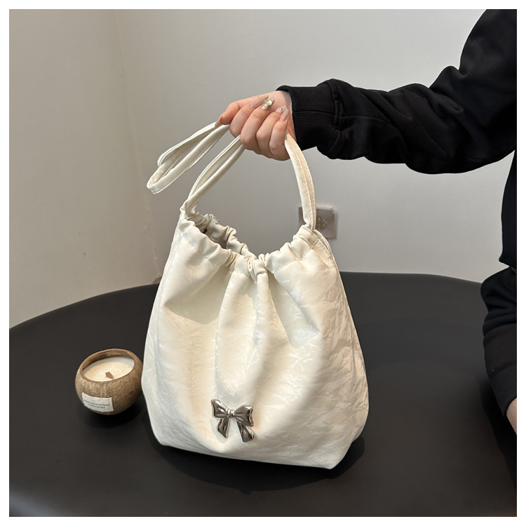 Large-capacity, elegant commuter tote bag, bow single-shoulder bag, distinctive pleated crossbody bag, 2024 new style bag trend undefined