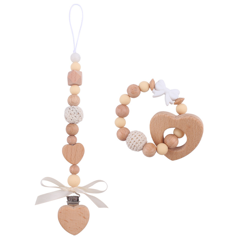 Nuevo bebé hecho a mano bowknot chupete cadena calmante bebé DIY amor mordedor pulsera juguete conjunto de dos piezas