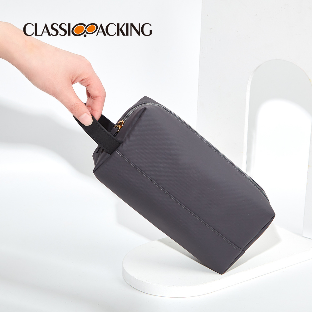 Bolso cosmético moderno y simple para hombres y mujeres bolso de lavado portátil impermeable material de PU bolso de almacenamiento de belleza de viaje de negocios
