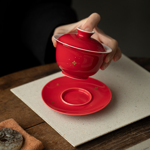 Red festive ceramic tea cup for home use