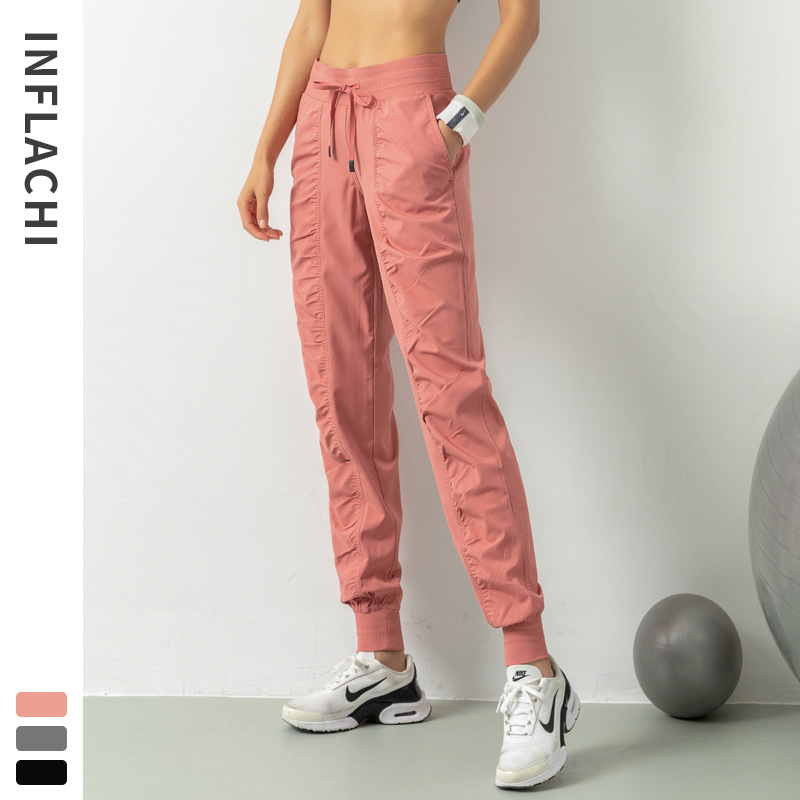 Pantalones deportivos transpirables de primavera y verano 2024 personalizados, pantalones deportivos de entrenamiento de carrera sueltos delgados para mujer, pies casuales de nueve puntos