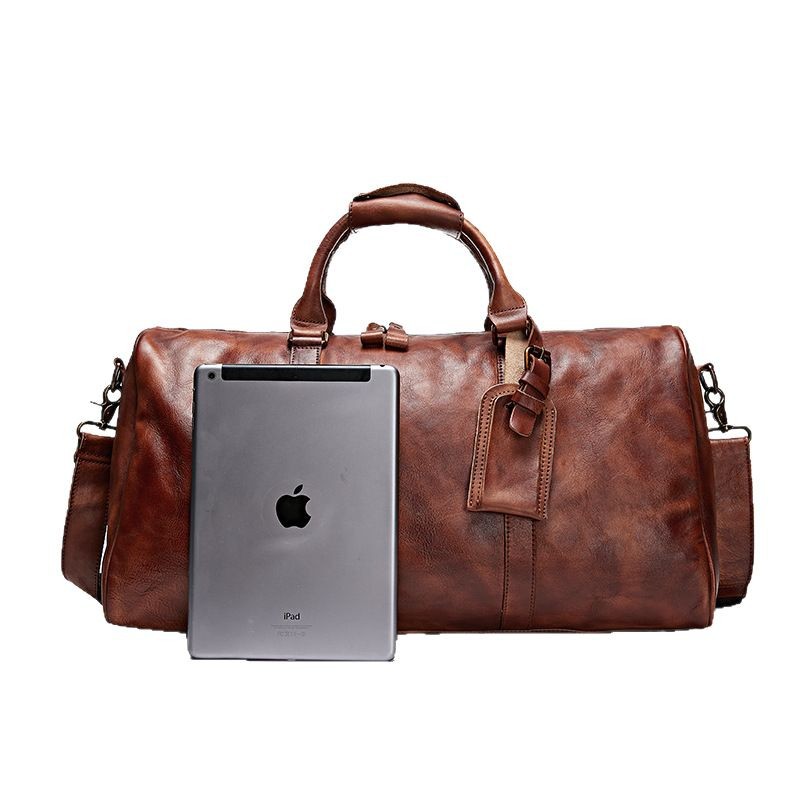 Bolso de viaje unisex de cuero transfronterizo Bolso de gimnasio de mensajero de un solo hombro Bolso de equipaje ultraligero de cuero curtido vegetal