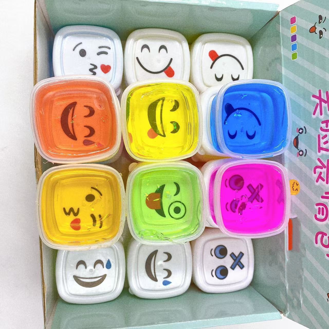 Nuevo 24 en la cara sonriente emoji bolsa goma espumante slime barro colorido para niños barro de cristal juguetes al por mayor