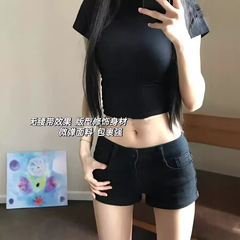 ギャルの黒い腰の低いデニムのショートパンツの女子学生の夏の新型のアメリカのレトロな弾力のガードルのお尻の熱いズボンの潮を包みます。