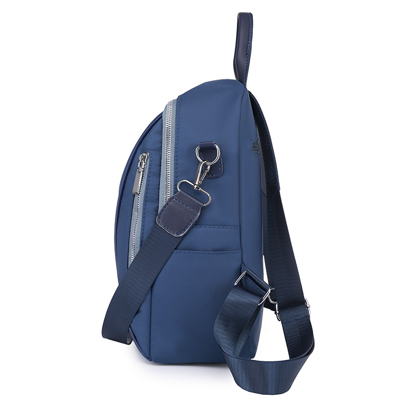 2023 verano nuevo estilo coreano casual Oxford tela mochila femenina moda simple mochila de viaje multifuncional al por mayor