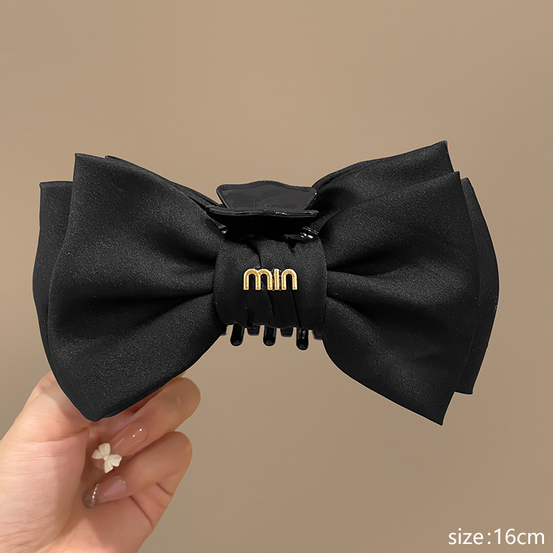 Min black double-sided large bow grip clip