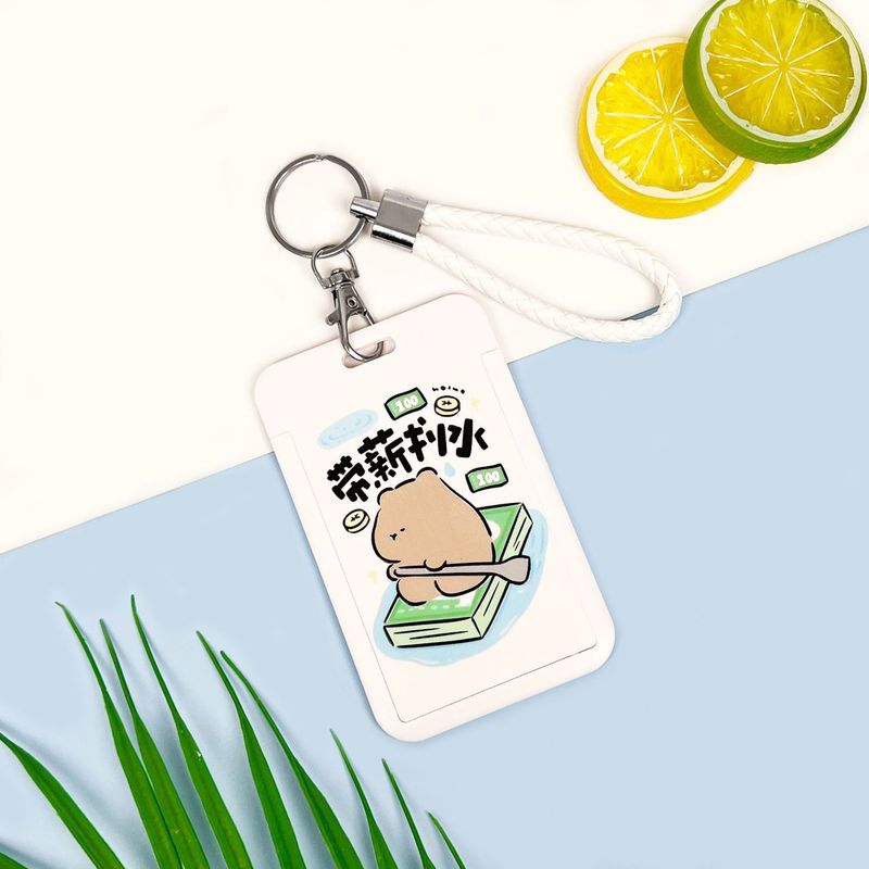 学生の漫画のカードカバーのかわいい熊の食事カードのバスの地下鉄のカードの包みはぼろぼろな文学の胸の札の保護カバーのメーカーを並べます。|undefined