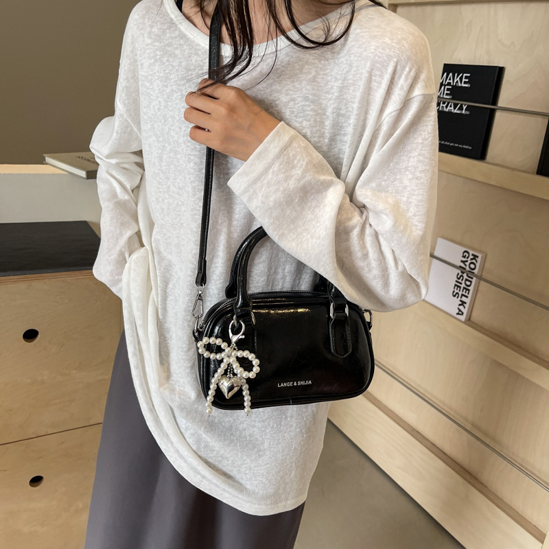 Bolso de mano de alta textura versátil verano 2024 nuevo bolso de mujer estilo extranjero versátil bolso de hombro bolso de viaje