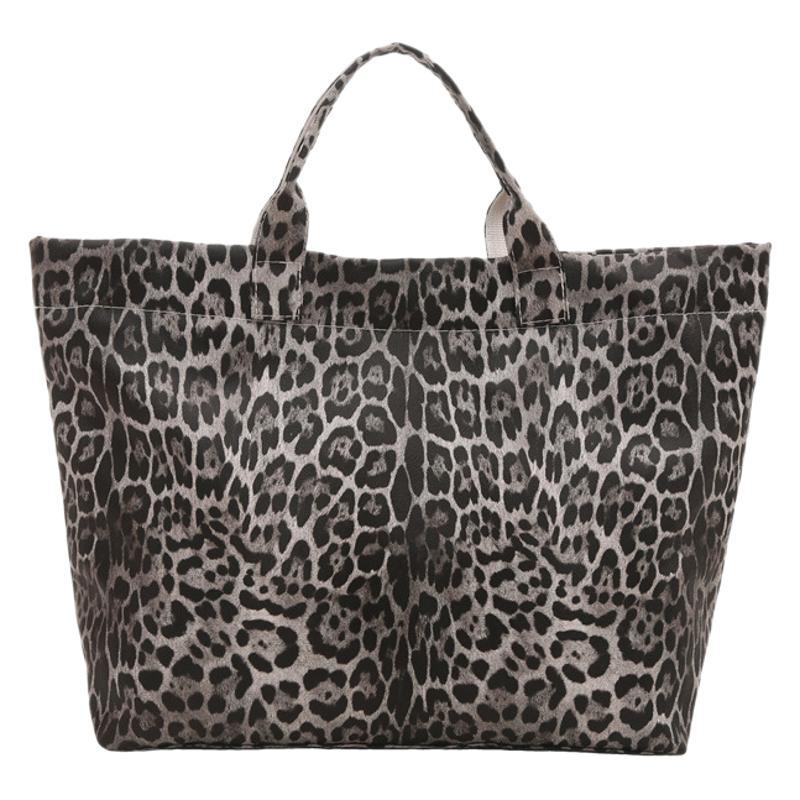 Transfronterizo 2025 nuevo estilo simple de moda de viaje portátil de hombro bolsa de mano para mujeres Europa y América retrógrado leopardo de gran capacidad de marea