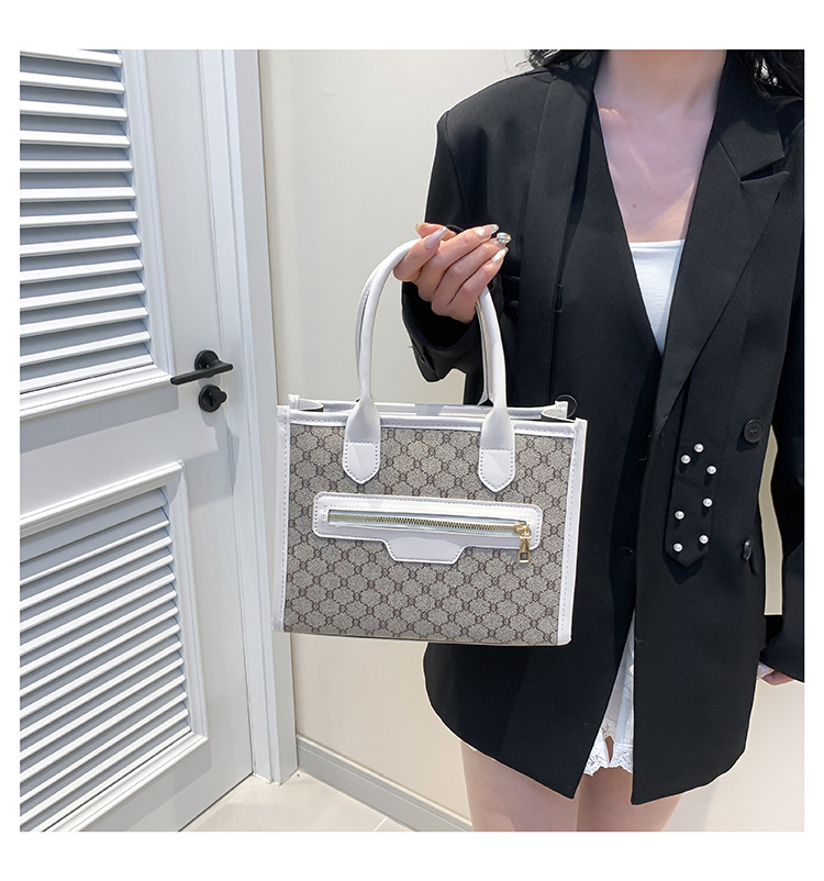Small niche design, beautiful and personalized handbag for women 2024 new fashionable splicing trend, large capacity_voghion.com