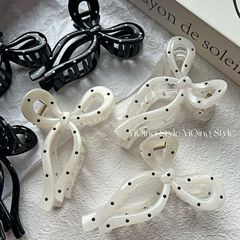 フランスのシンプルな白黒の波点は高級感の大きいサイズの新型のヘアピンを挟みます。