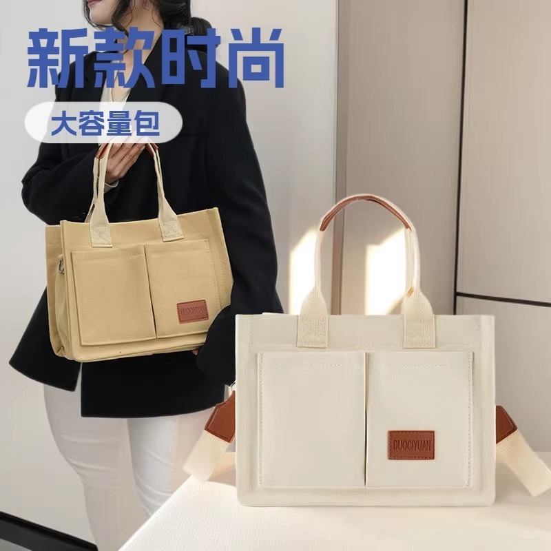 Bolso de lona de mujer 2026 nueva moda, bolso de tramo inclinado de gran capacidad, bolso de mano de bolso multibolsillo, bolso de mujer de viaje