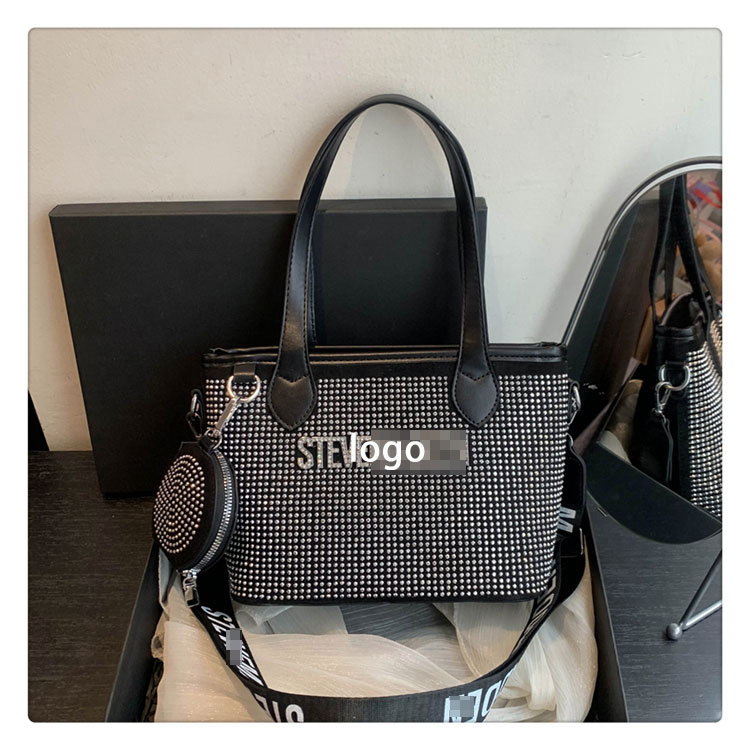Bolso de letras de diamantes de imitación transfronterizos diseño de nicho femenino moda simple portátil popular 2025 nueva textura bolsa de mensajero