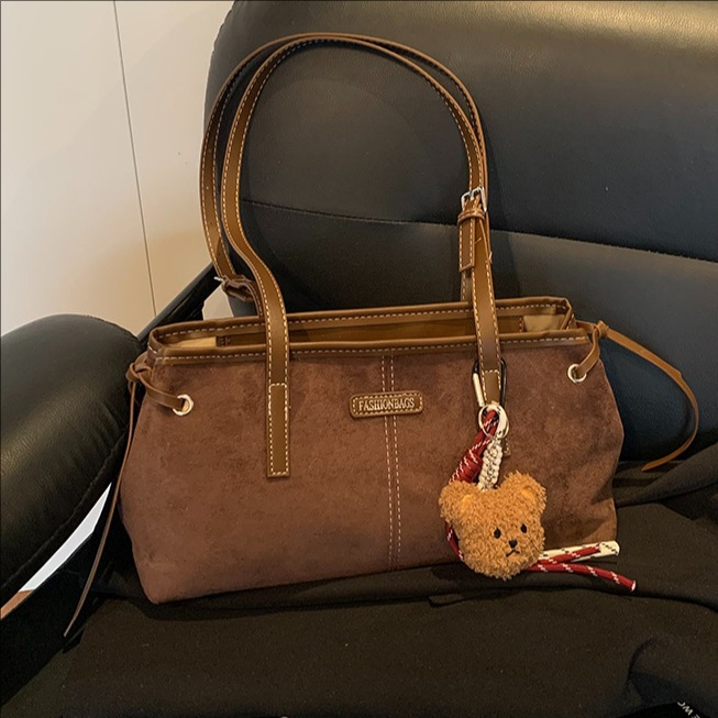 Bolsa de terciopelo coreana retro de seda para mujeres otoño / invierno 2025 nueva moda versátil bolso de hombro con brazo bolso de viaje