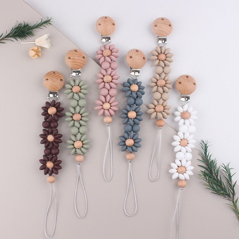 Nuevos productos para bebés, clip de chupete redondo de madera de haya, reconforta la cadena de chupete de silicona de girasol del bebé