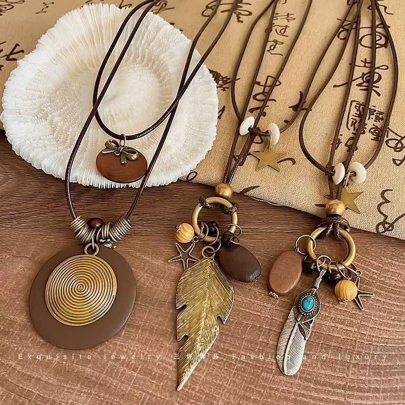 New Chinese Style Retro Long Sweater Chain Zen Feather Necklace Women's 2024 New Ethnic Style Stacking Accessories Autumn