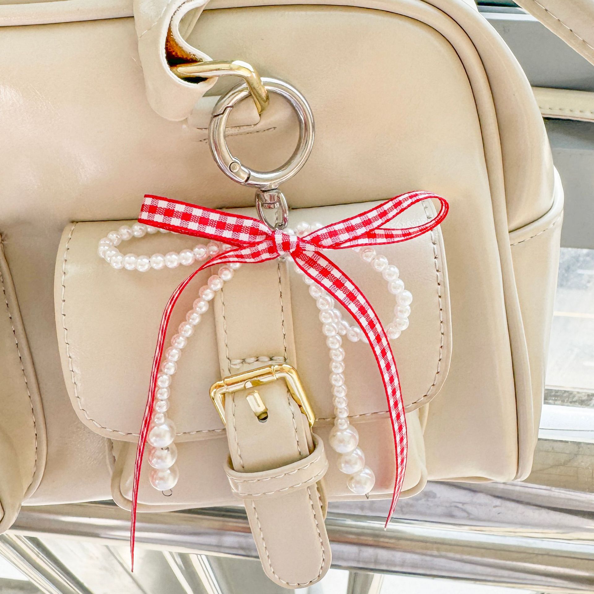 Coreano estricto color curry cinta arco perla bolsos bolsos llavero de encaje dulce bolsos colgantes pequeños vientos fragrantes