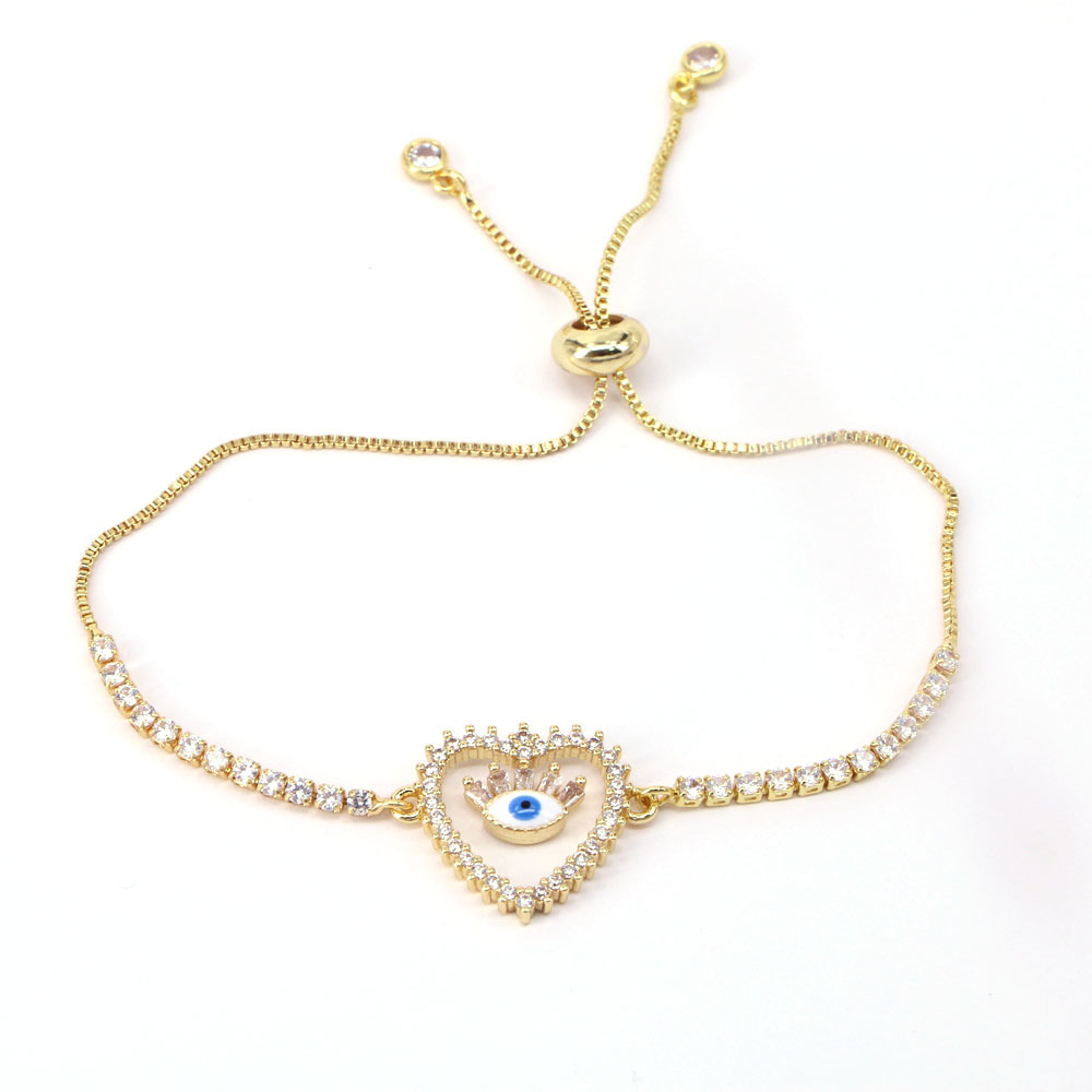 Pulsera De Ojo Malvado De Circonio Con Micro Incrustaciones De Oro 18k De Cobre En Forma De Corazón De Moda display picture 4