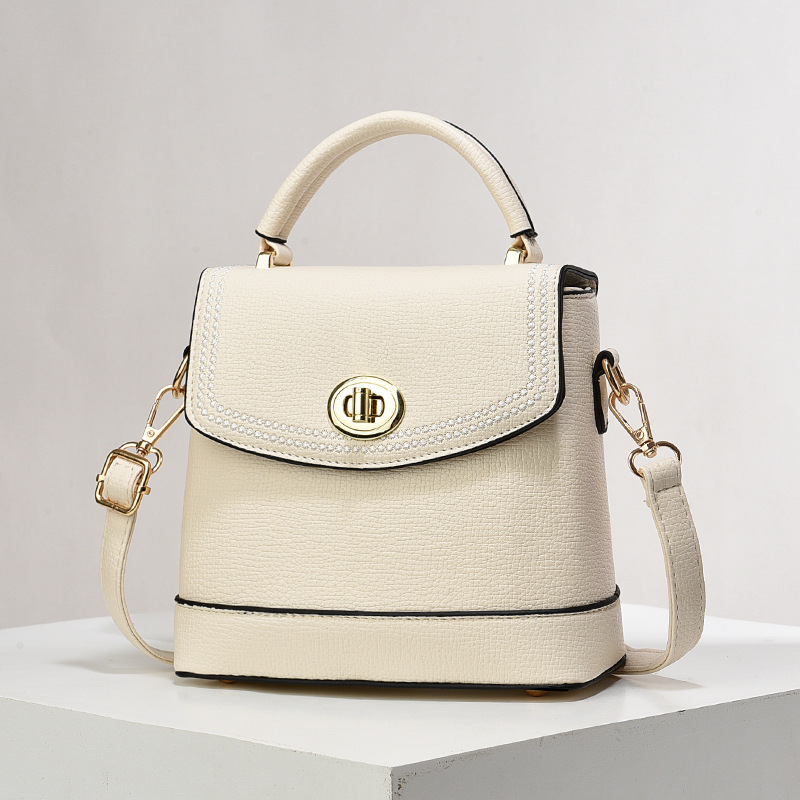 Bolso de mujer nuevo nicho de diseño texturizado bolso de hombro de moda moda bolso de mano práctica mochila bolsas