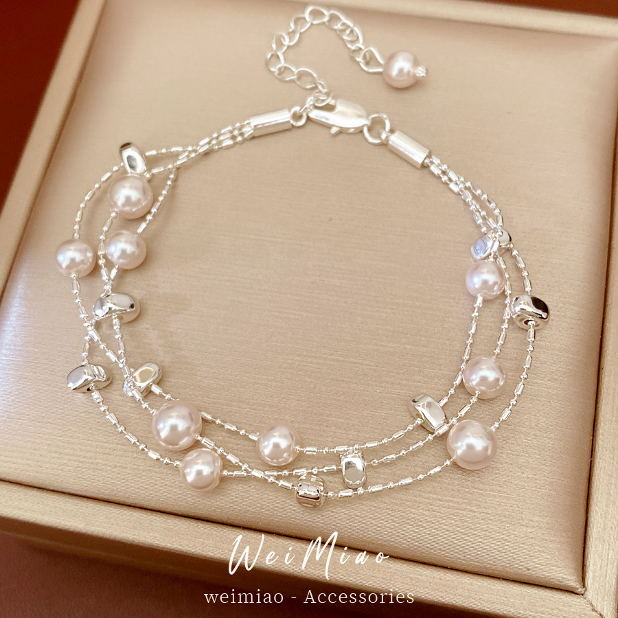 Pulseras de perlas redondas multicapa ligeras de lujo nicho pulseras de alta calidad temperamento de moda universal joyas al por mayor para mujeres image 4